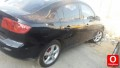 Mazda 3 cam su bidonu