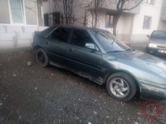 Mazda 323 hasarlı oto çıkma parça Mısırcıoğlu oto