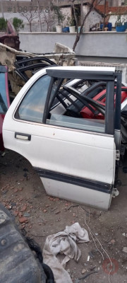 CIKMA MITSUBISHI LANCER SAG ARKA KAPI BEYAZ
