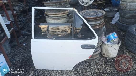 Tofaş sol arka kapı boyasız