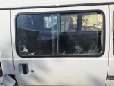 Mitsubishi L300 sol orta kapı camı