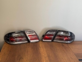 MERCEDES W210 SIFIR HELLA BLACK FÜME STOP TAKIMI - ERCAN TİCARET