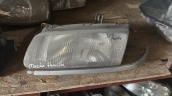 OTO CEMDEN ÇIKMA MAZDA 323 FAMİLİA SOL FAR