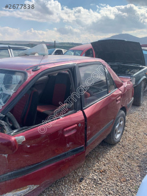 Mazda 323 sol arka kapı