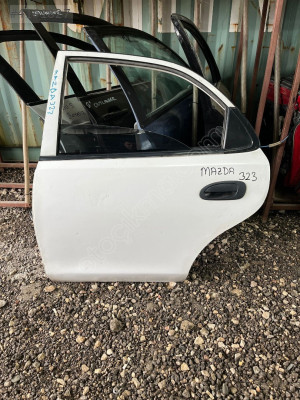 MAZDA 323 SOL ARKA KAPI DOLU MONTECAR