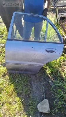 Proton sag arka kapı
